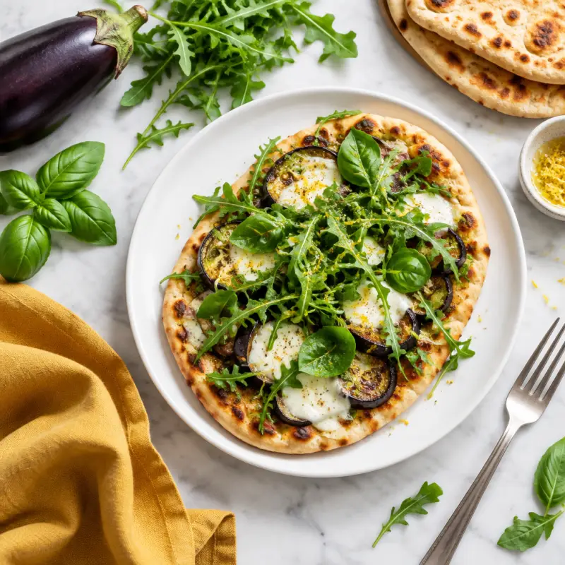 Roasted Eggplant Flatbread with Mozzarella, Basil & Lemony Arugula, plated