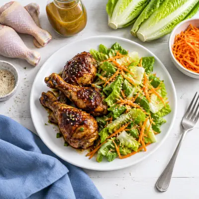 Baked Hoisin Drumsticks with Sesame Romaine & Carrot Salad
