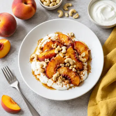 Maple-Cinnamon Roasted Peach & Cashew Yogurt Bowl