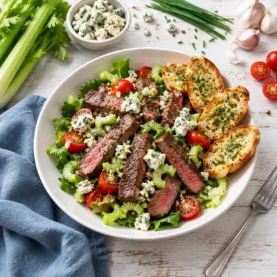 Steak Salad with Celery, Tomatoes, Blue Cheese & Garlic-Chive Crostini